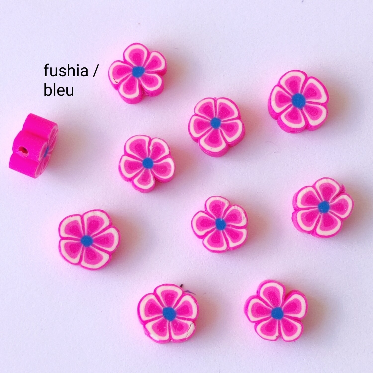 10 perles fleurs fushia / bleu