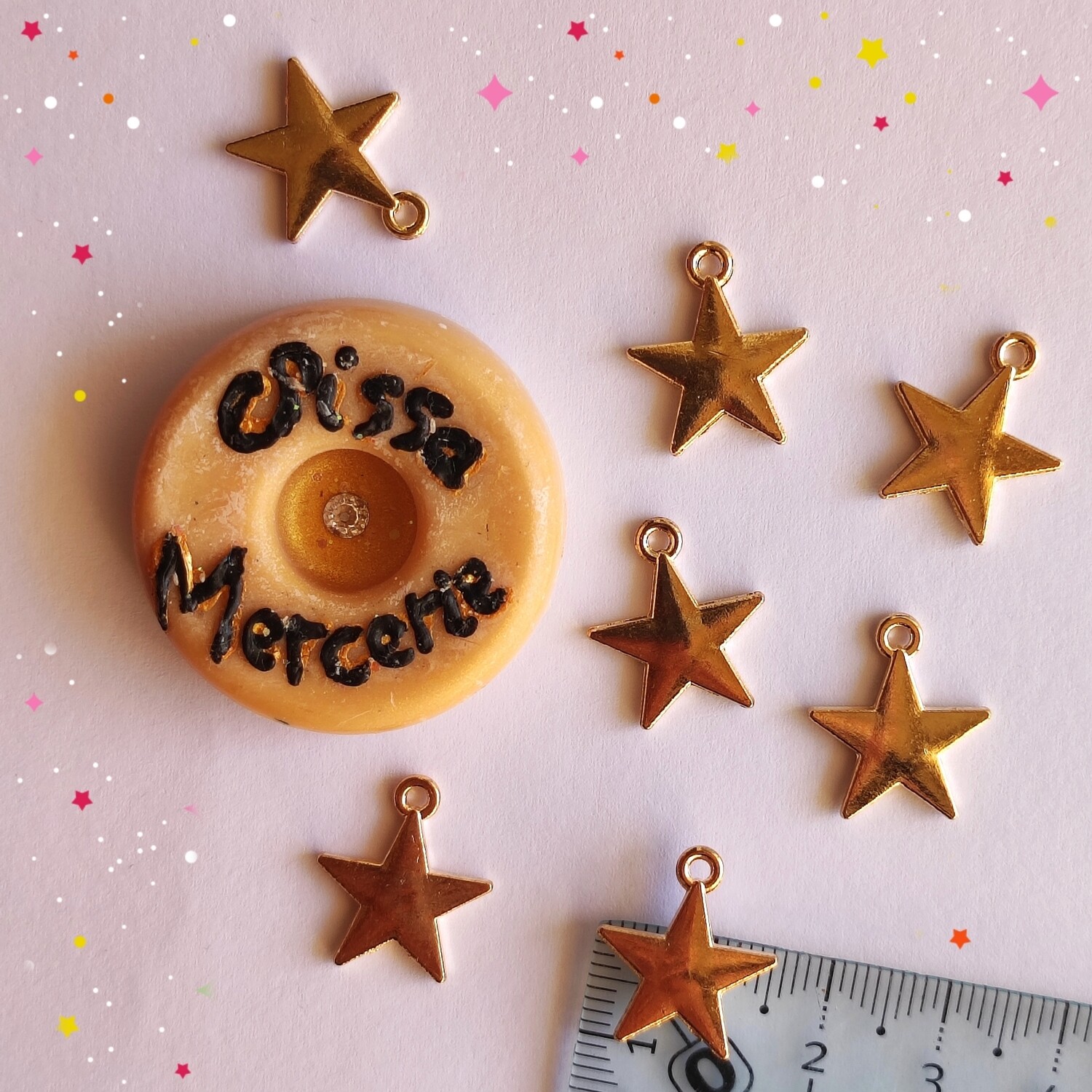 Pendentif étoile doré 1,5 cm? 