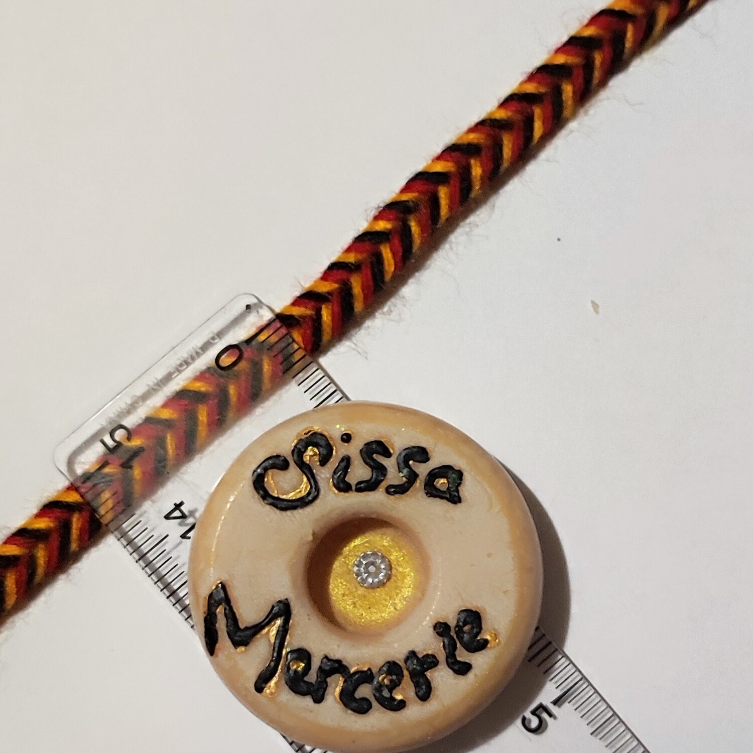 Galon tresse 5mm noir/rouge/orange