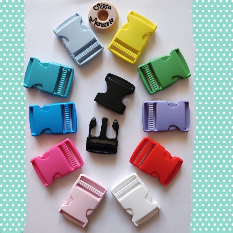 Boucle plastique 32 mm/11 couleurs au choix