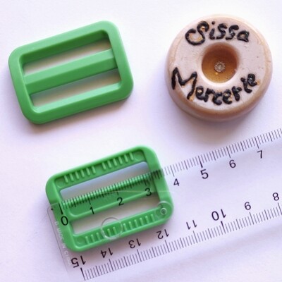 Boucles coulissantes plastique