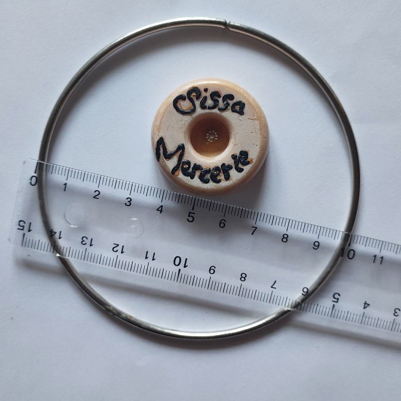 Anneau circulaire argenté 10 cm