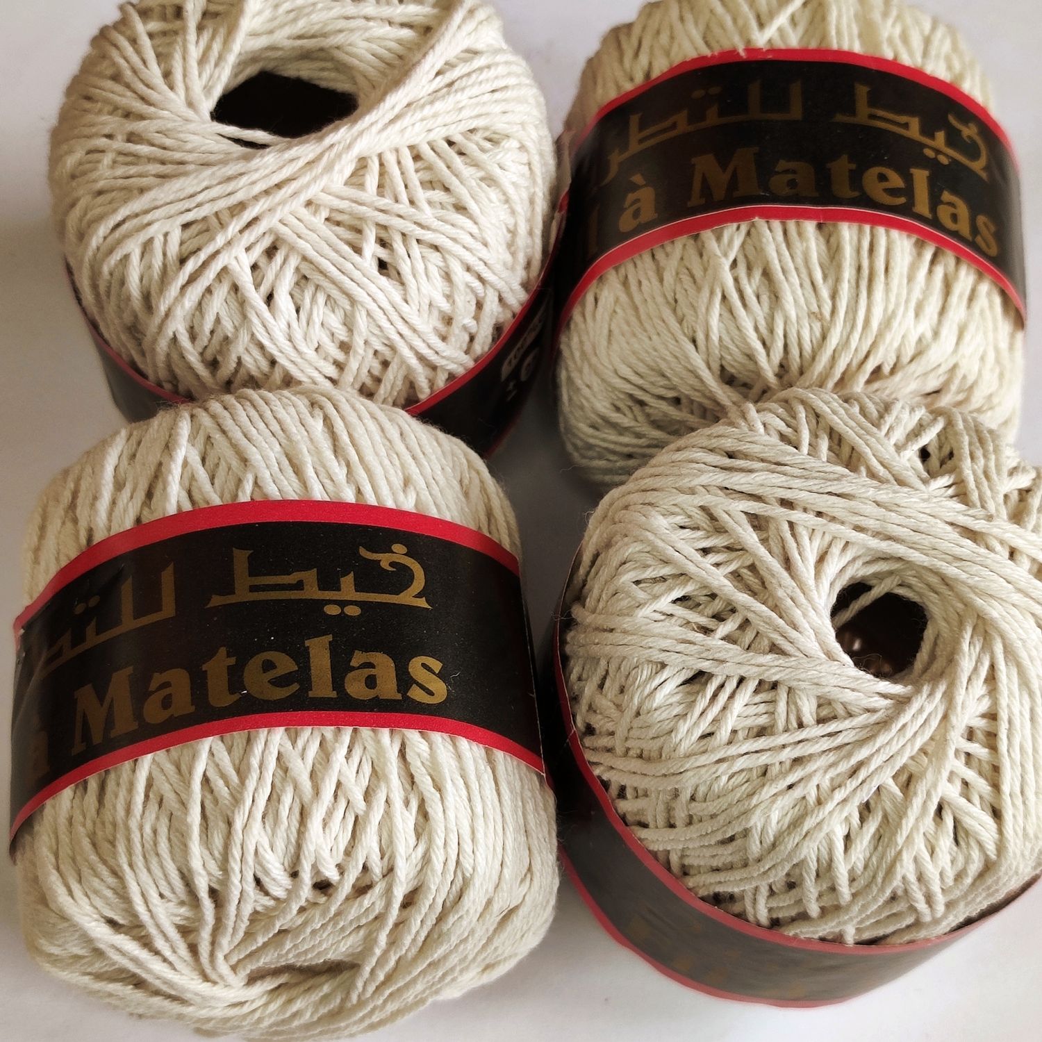4 pelotes écru coton/polyester