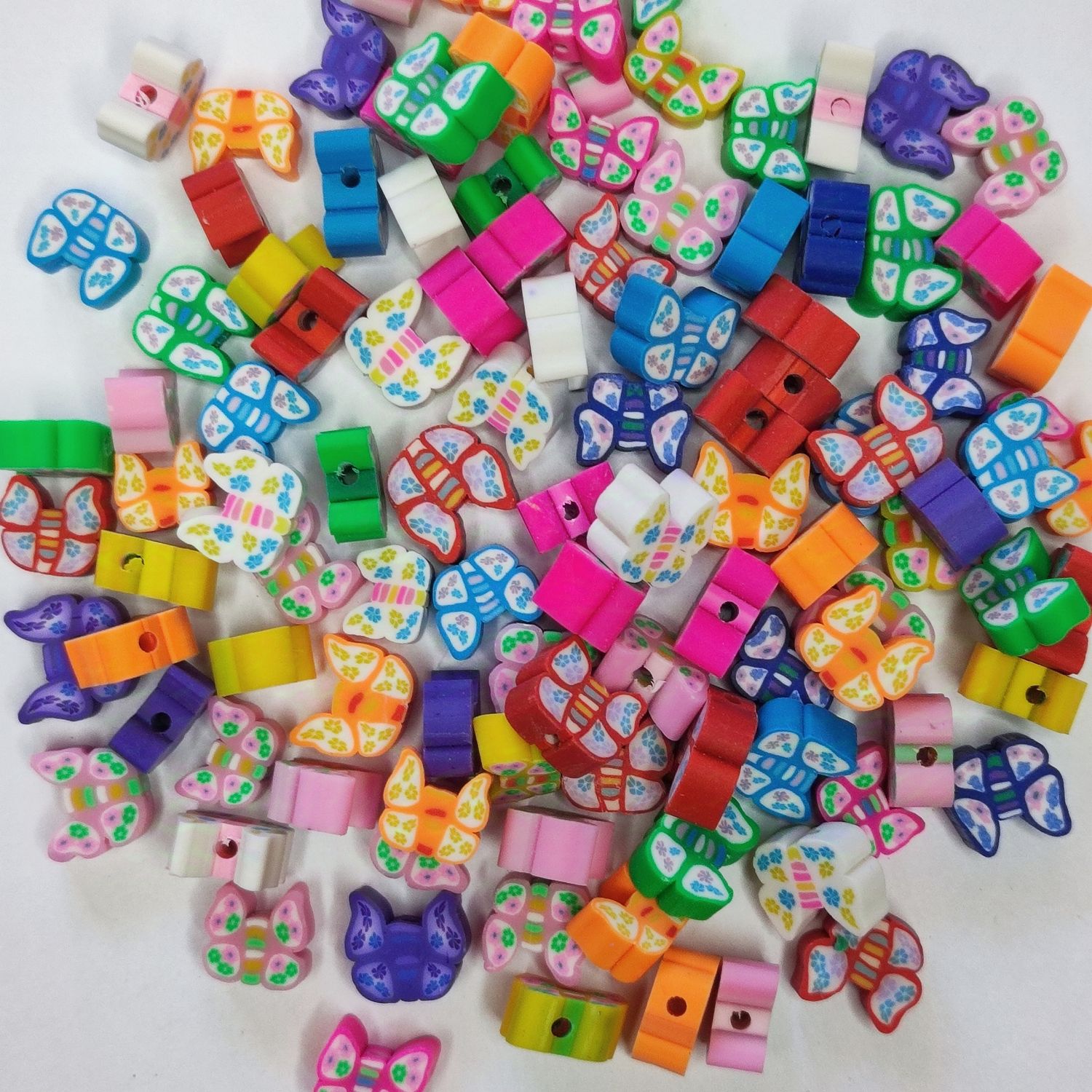 100 perles papillon en polymère