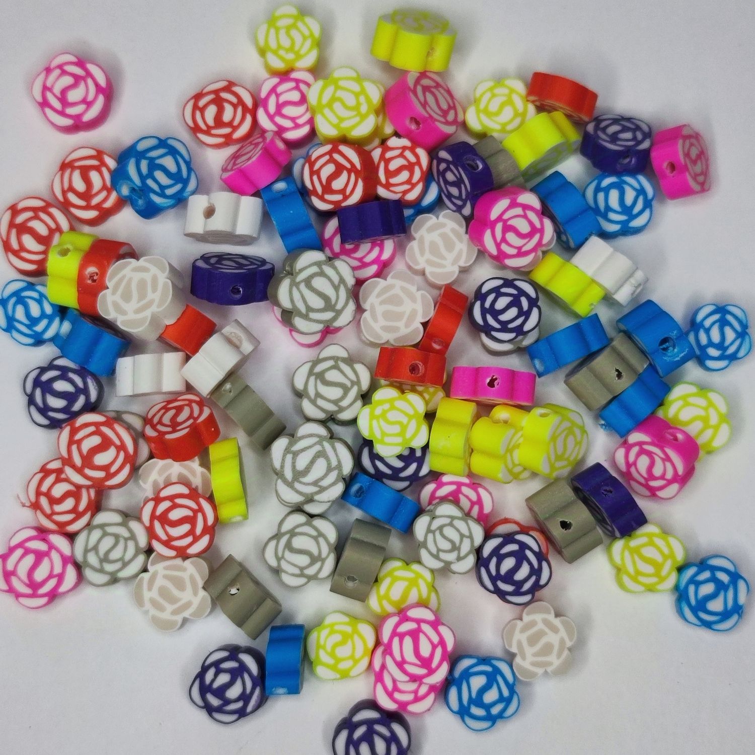 100 perles roses en polymère