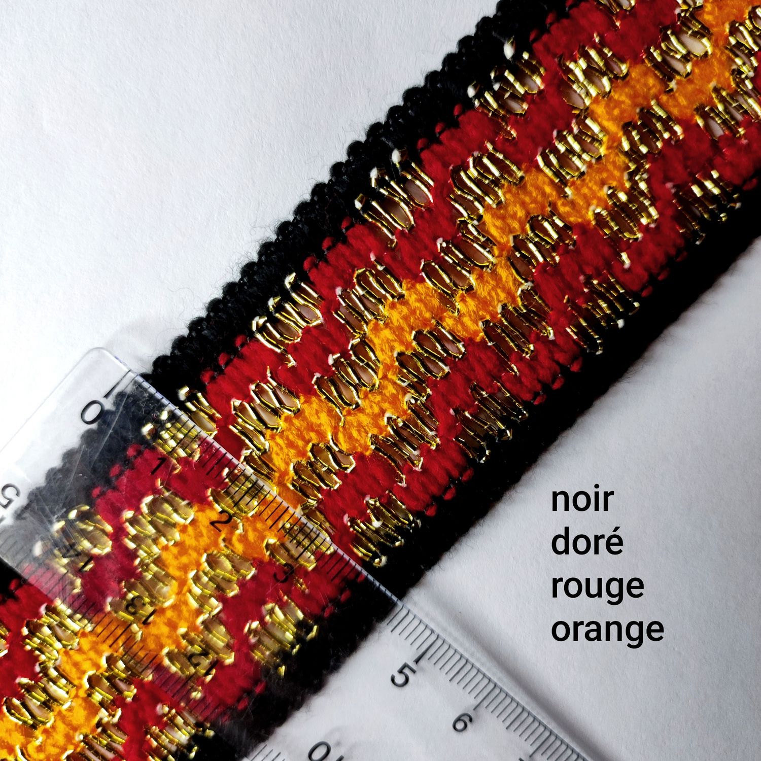 Galon doré noir/rouge/orange 4,5cm