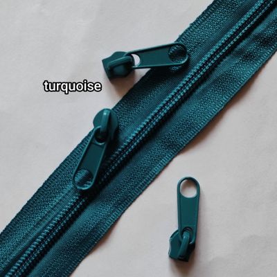 Zip au mètre turquoise avec 2 curseurs 