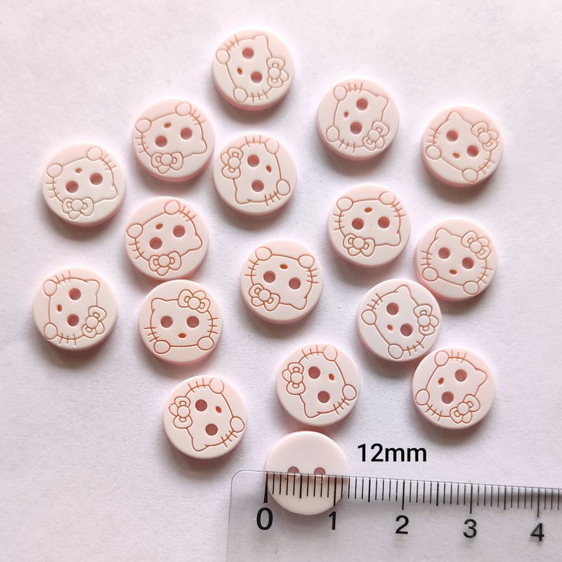 30 boutons chat 12mm blanc/rose