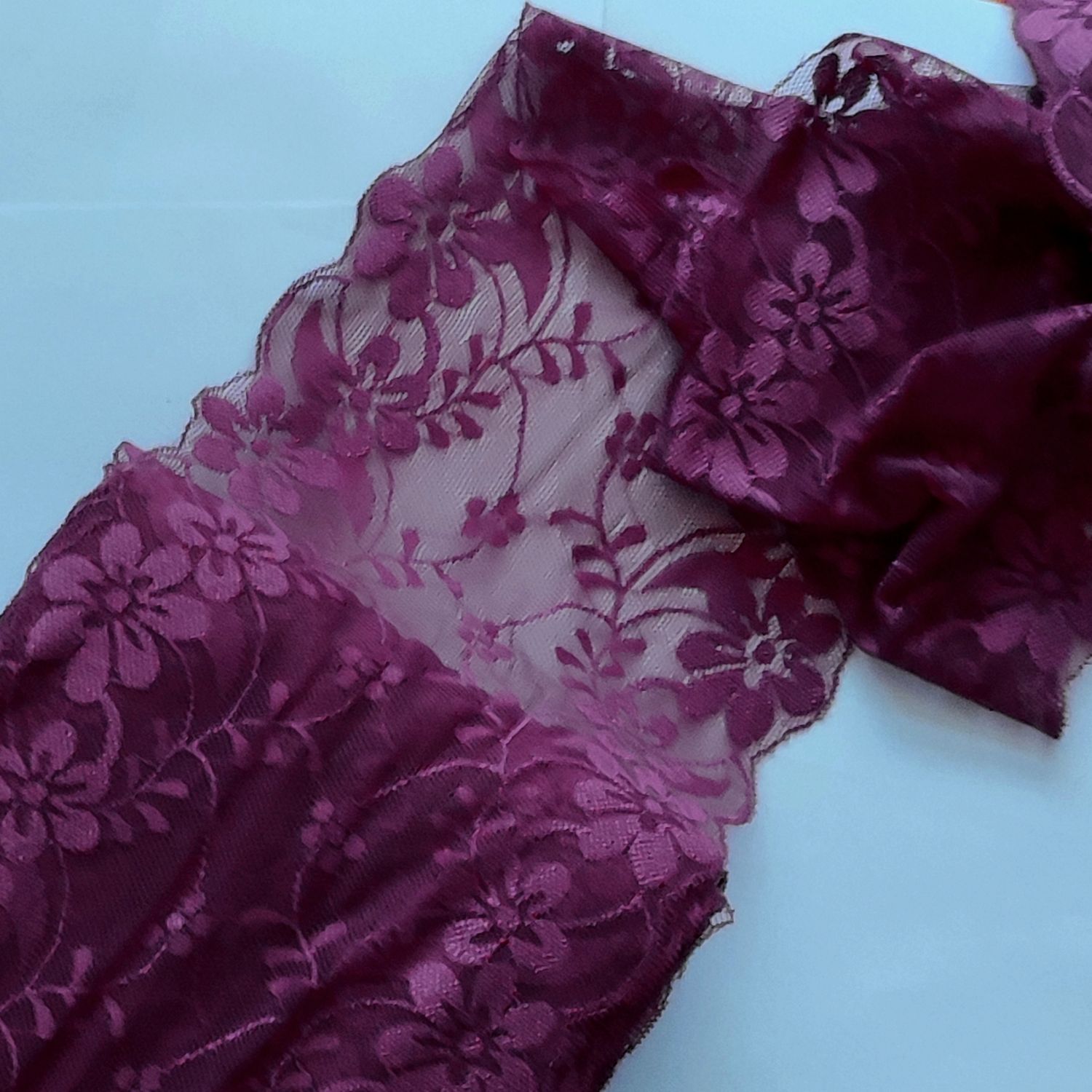 Dentelle élastique large 18 cm prune clair