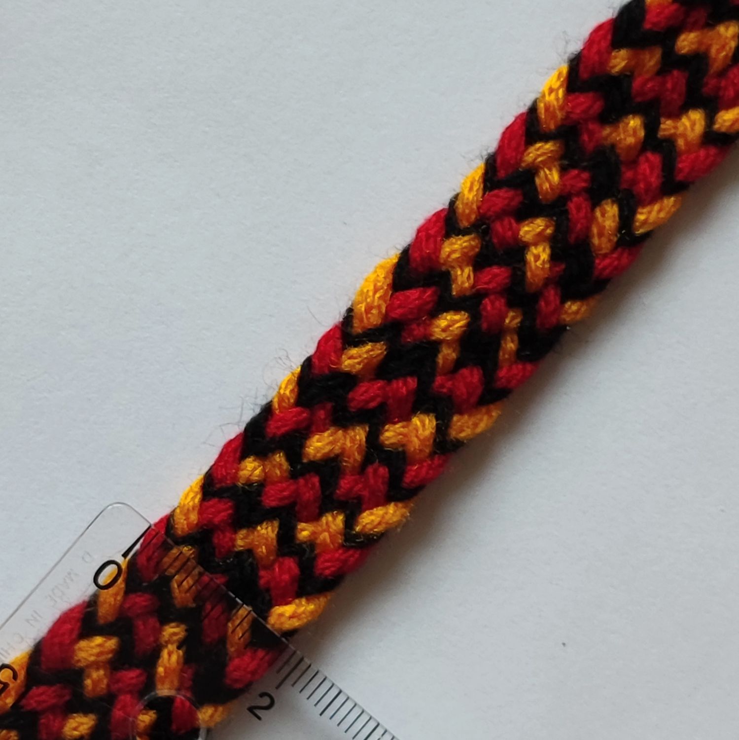 Galon tresse orange/noir/rouge 2 cm
