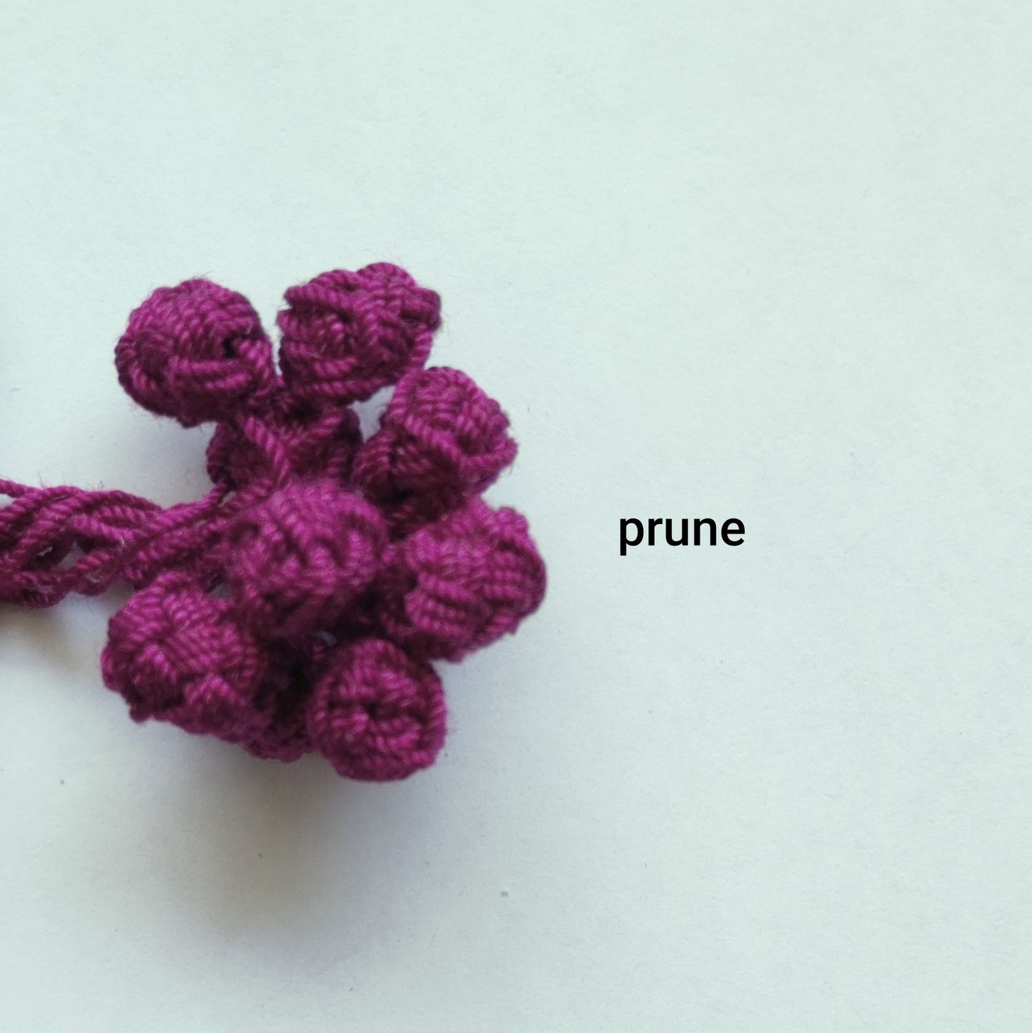 10 boutons caftan prune