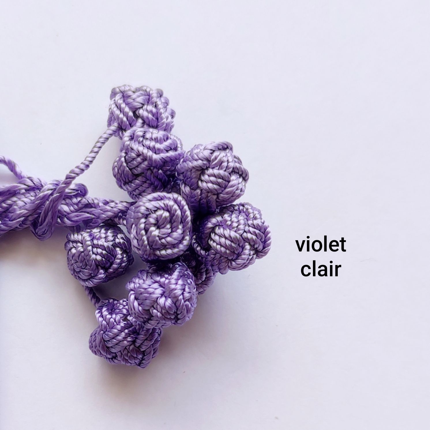 10 boutons caftan violet clair