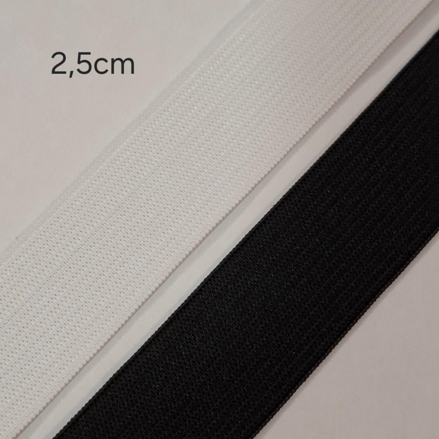 Elastique 2,5 cm au mètre (noir et blanc) Elastique 2,5 cm au mètre (noir et blanc)