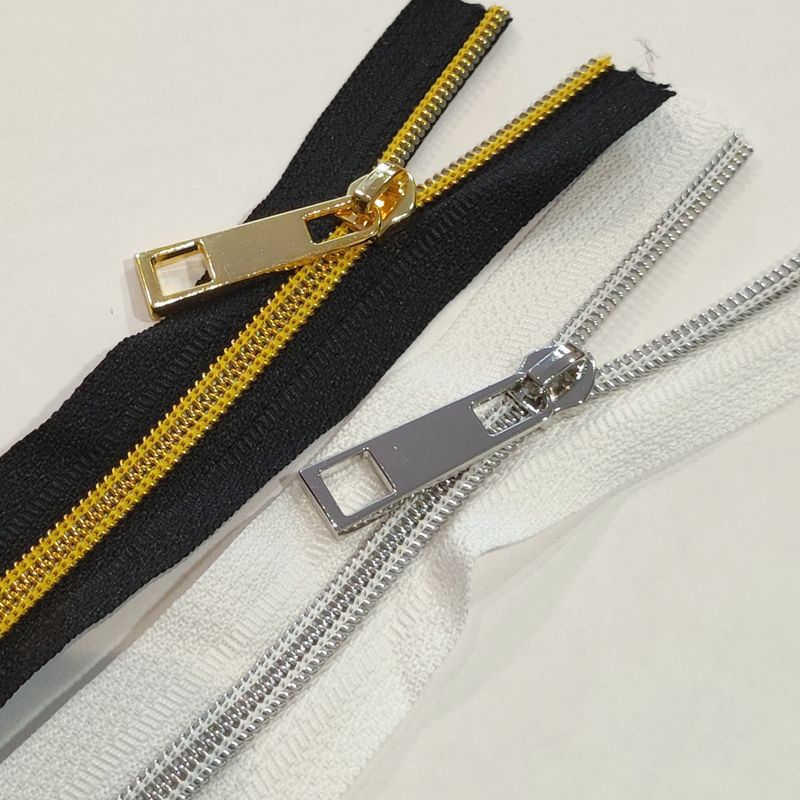 1 mètre fermeture zip dent argenté/doré + 2 curseurs