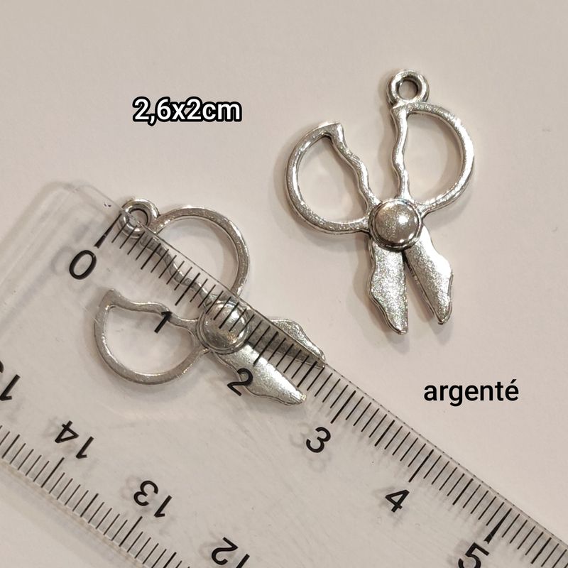 Pendentif ciseau argenté