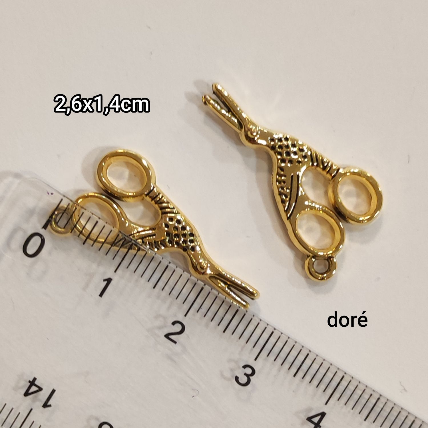 Pendentif ciseau doré