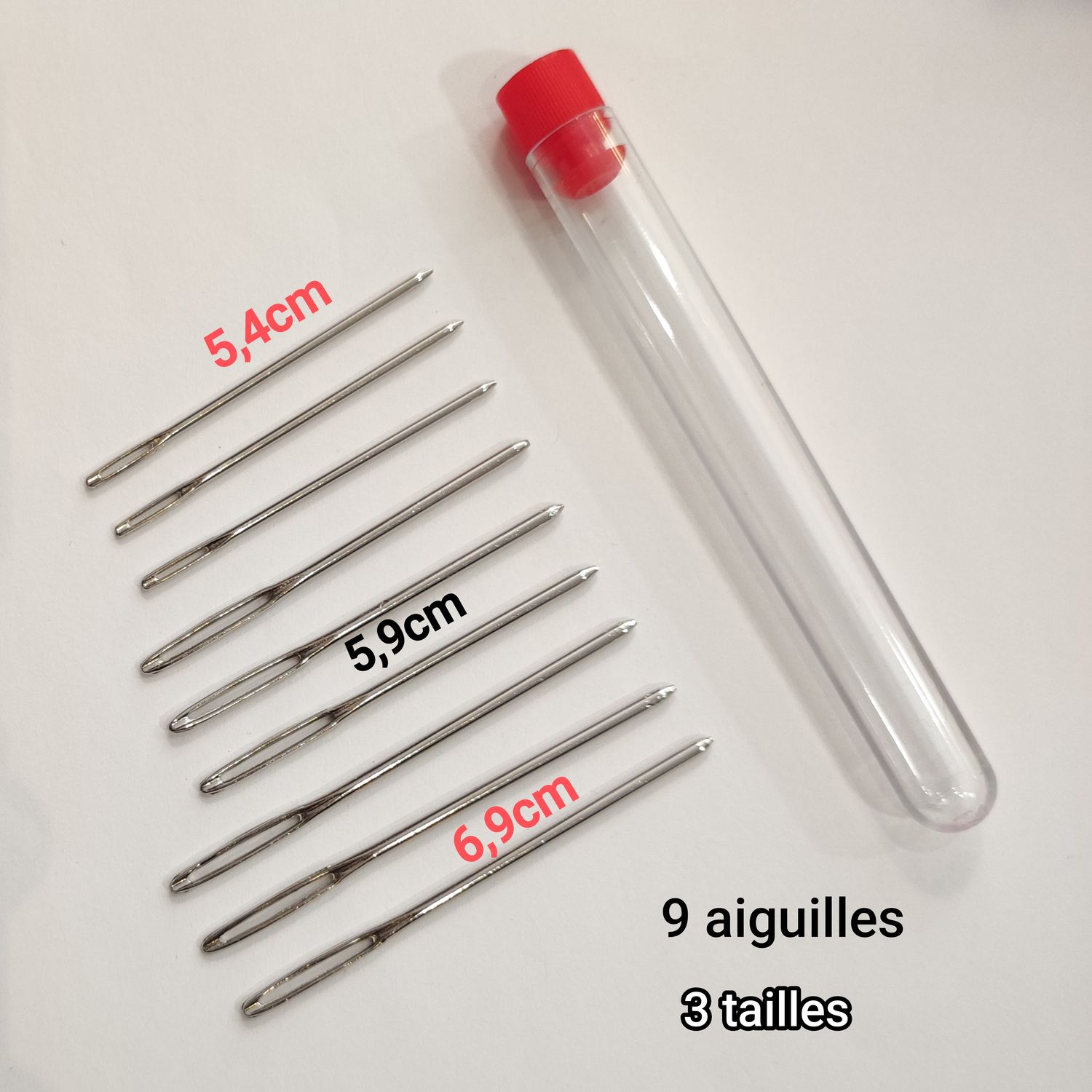 9 aiguilles à laine en tube