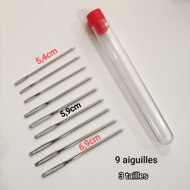 9 aiguilles à laine en tube
