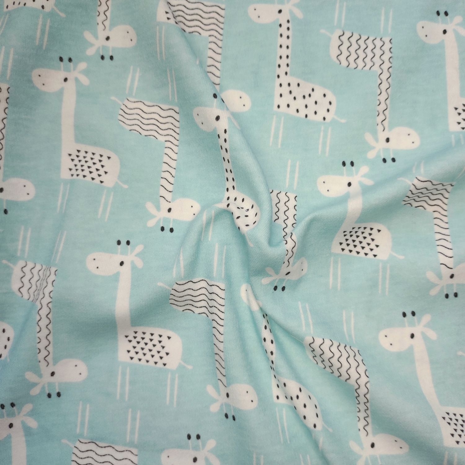 Tissus imprimé 100% coton jersey girafe bleu