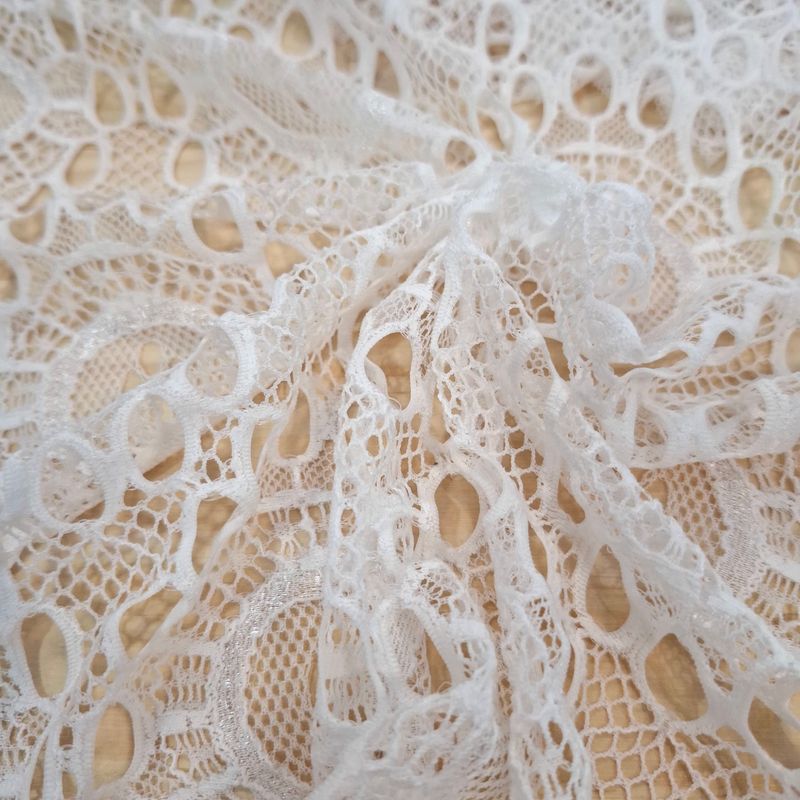 Dentelle blanche extensible 144cm au mètre