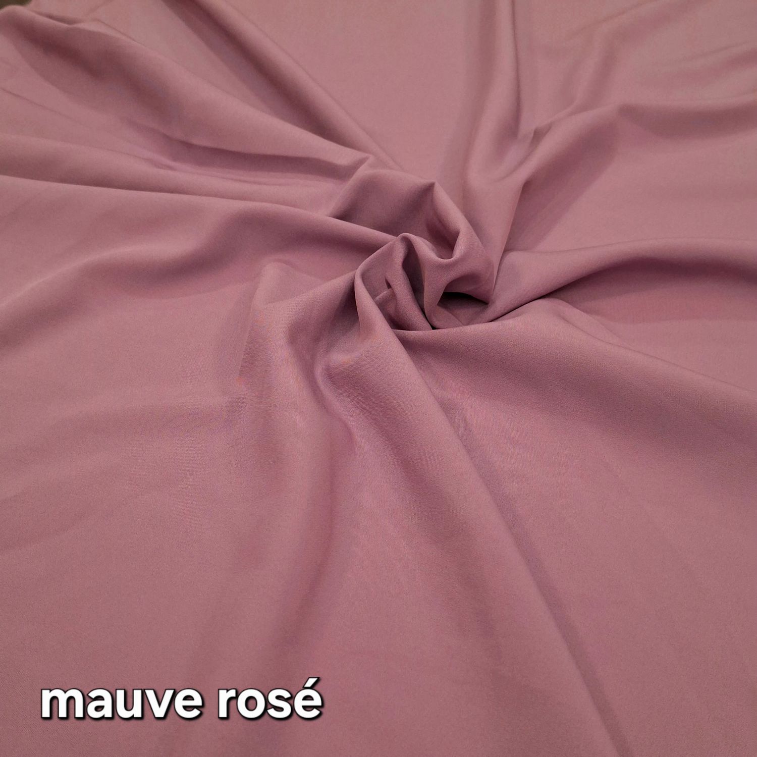 Tissu crêpe au mètre mauve rosé 