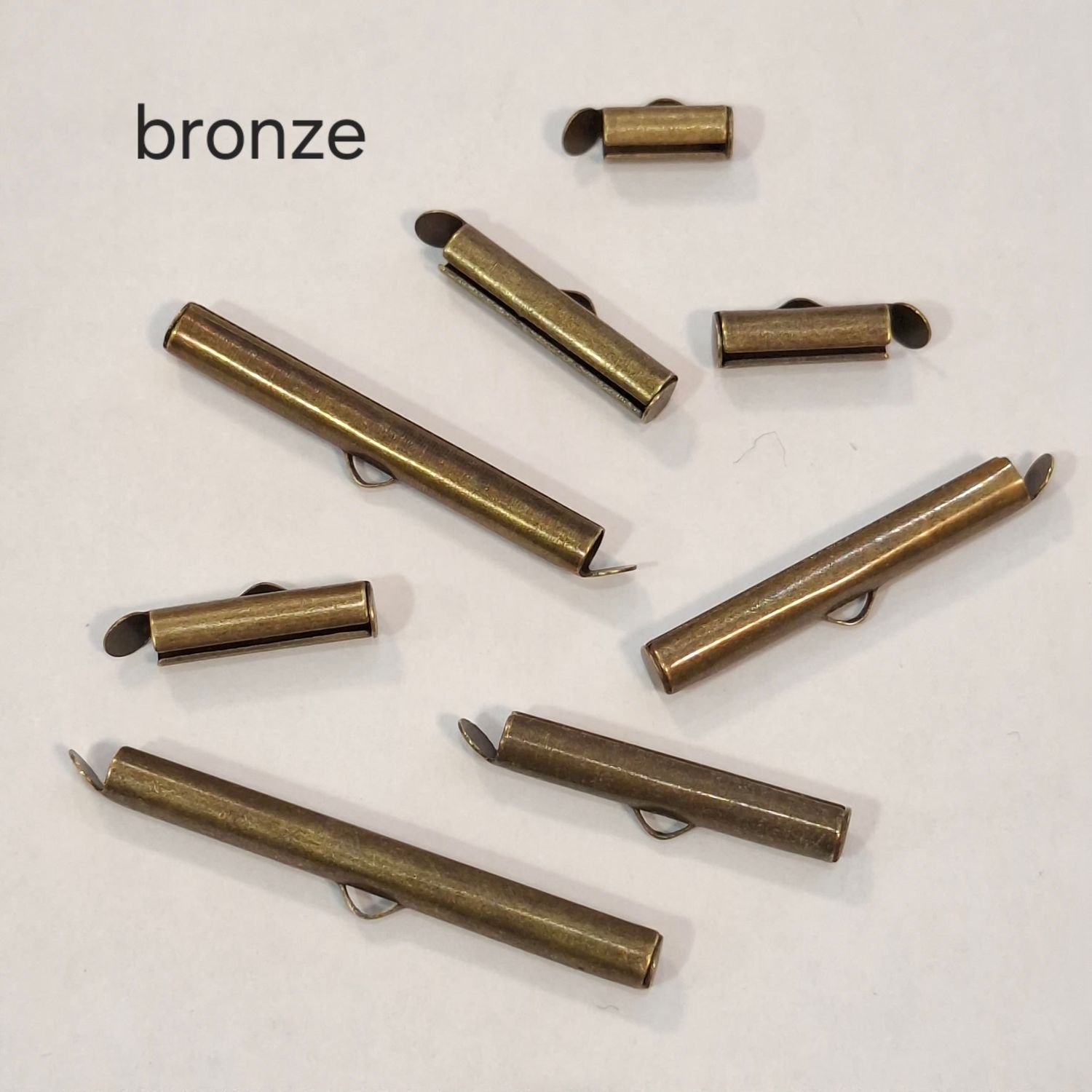 10 fermoir tube embout bronze (8 longueurs)
