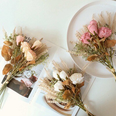 Burnt dried bunch of rose flowers