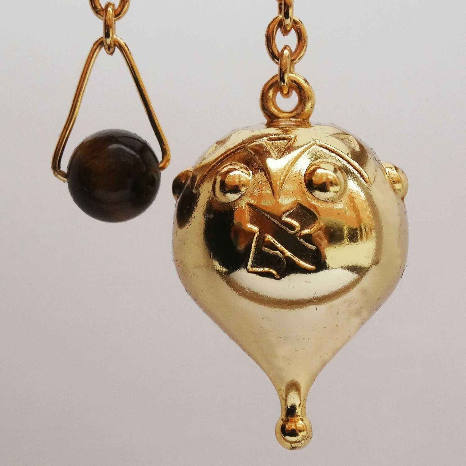 Péndulo Astral, baño oro
