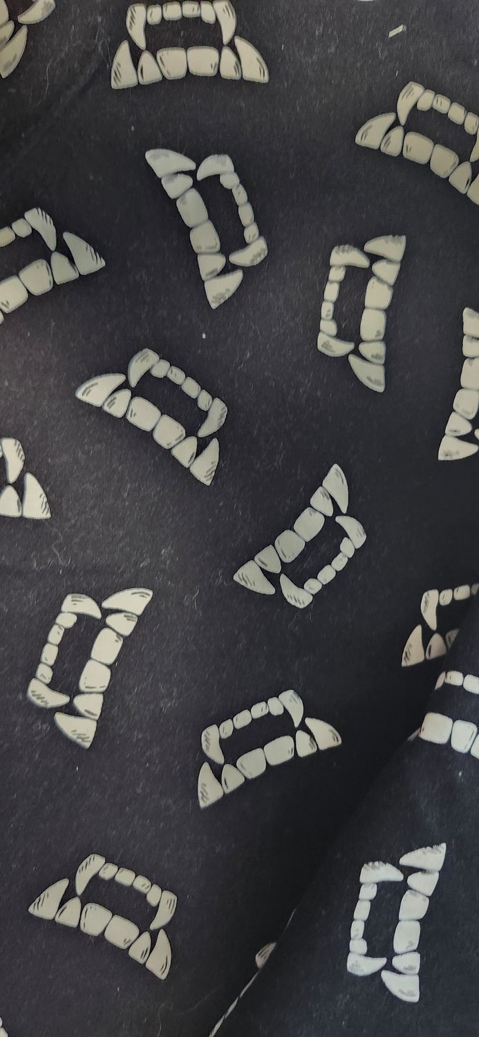 Glow in the dark vampire teeth