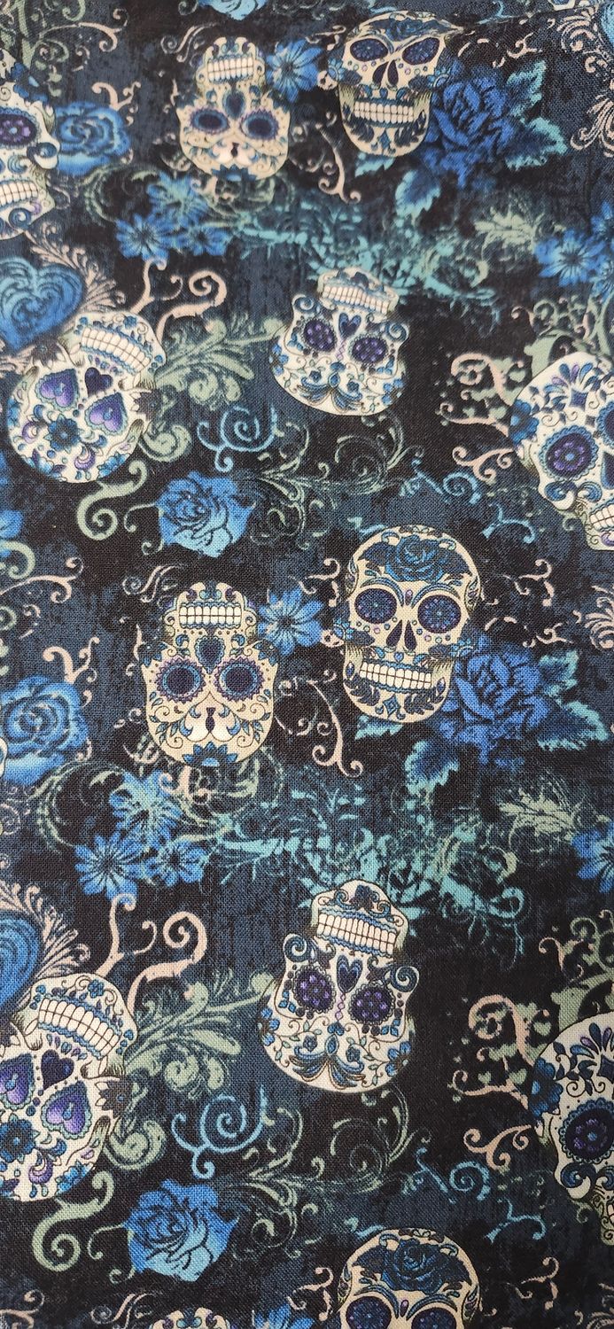 Sugar Skulls and blue roses
