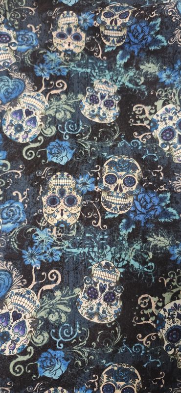 Sugar Skulls and blue roses