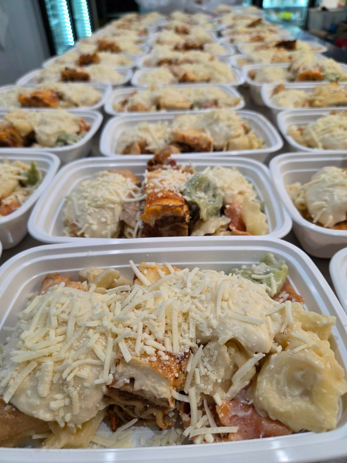 09. Italian Pasta Trio / Beef Lasagna, Chicken Penne Parmesan, Cheese Tortellini Alfredo