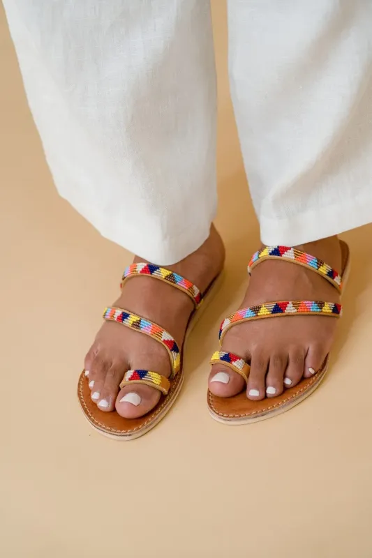 Leren slipper 'the strap' met kraaltjes- Africa