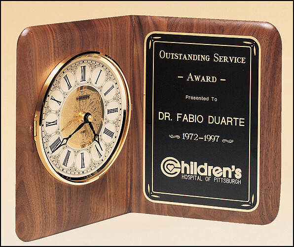 American walnut clock with a brass diamond-spun bezel