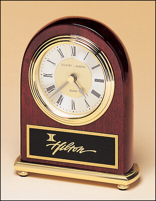 Rosewood Stained Piano Finish Clock on a Brass Base.