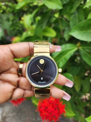 Black face gold watch