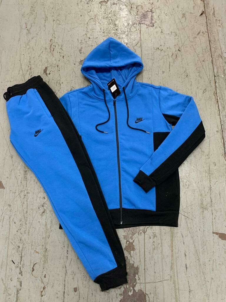 black and blue nike jogging suit