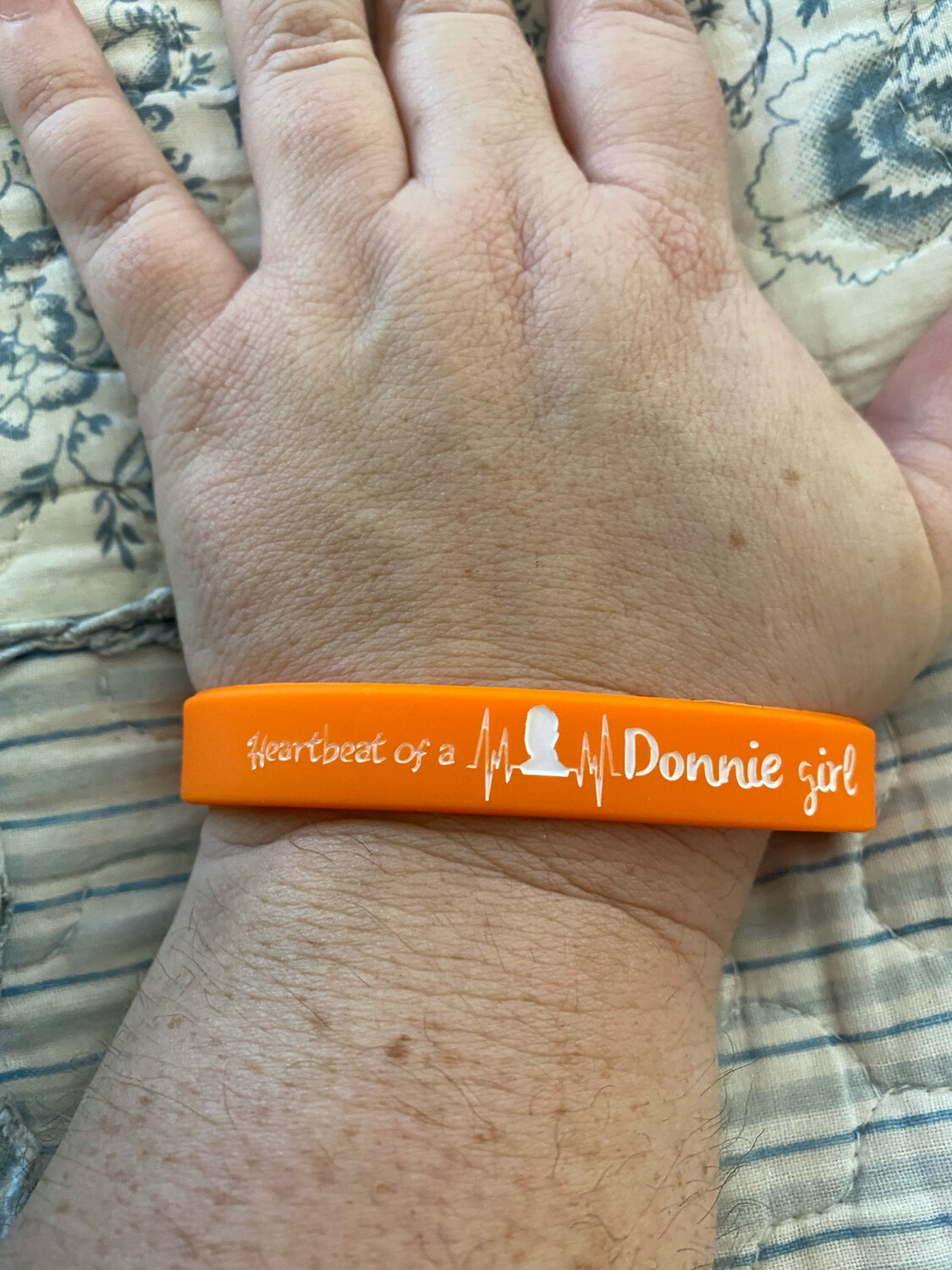 Heartbeat of a Donnie girl Wristbands (Orange Colour &amp; White Text)