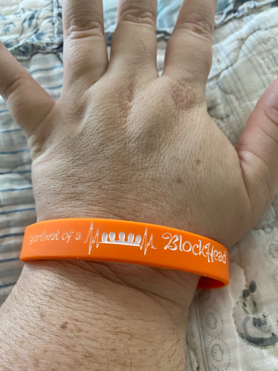 Heartbeat Of A Blockhead Wristbands (Orange Colour &amp; White Text)