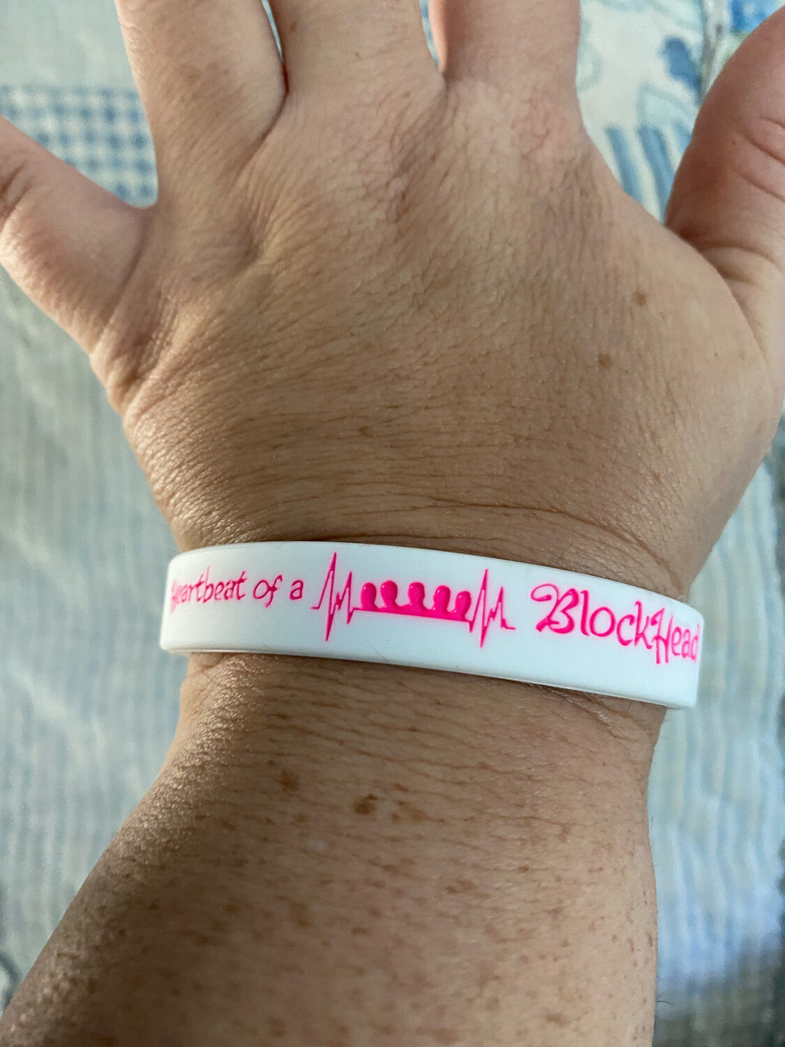 Heartbeat of a Blockhead Wristbands In White Colour &amp; Pink Text 