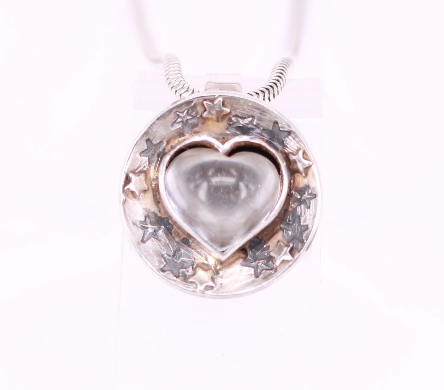 Bergkristall in Herzform mit sterndesign 