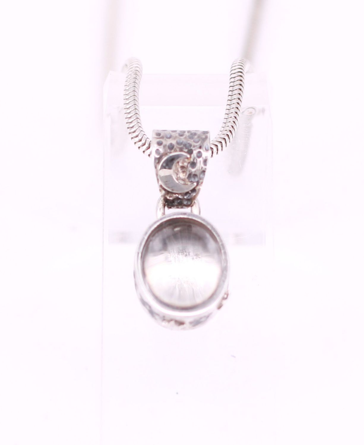 Tierhaarschmuck mit Bergkristall, verziert mit Mond und Sternen Tierhaarschmuck mit Bergkristall, verziert mit Mond und Sternen