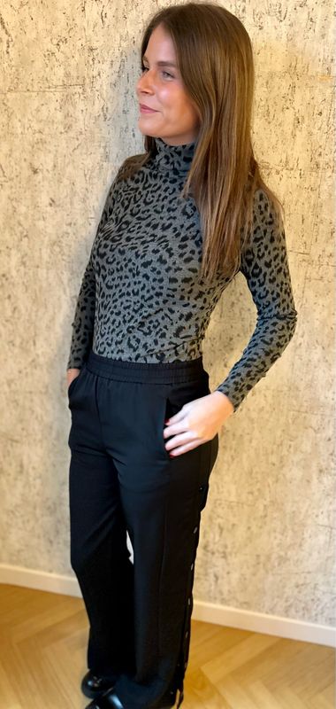 Pantalon pressions