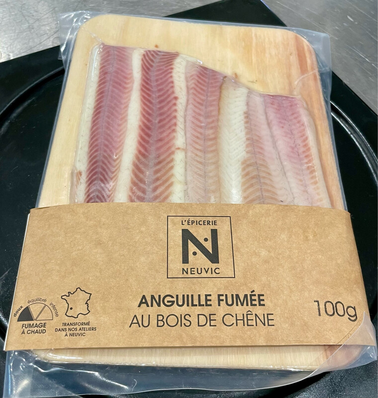 Filet d'anguille fumée artisanal, texture tendre et goût boisé
