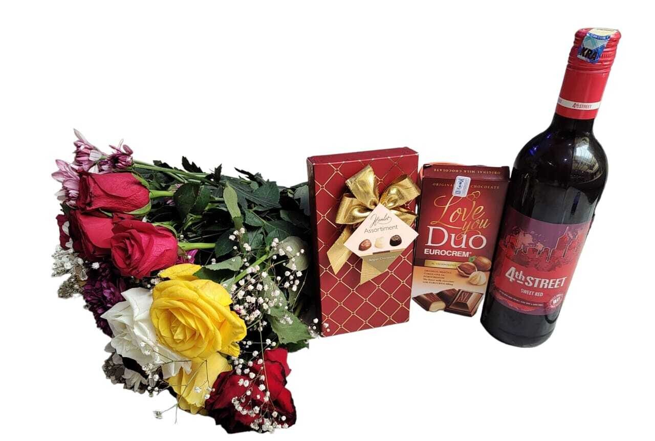 valentine's gift wine, assorted chocolate, flowers