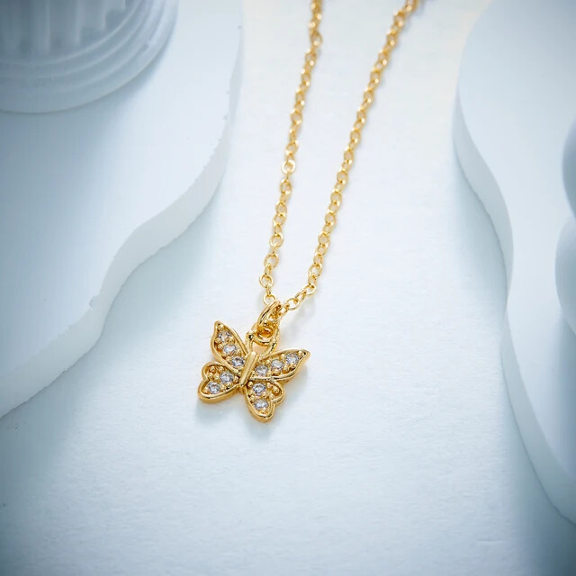 Gold butterfly shaped pendant necklace 