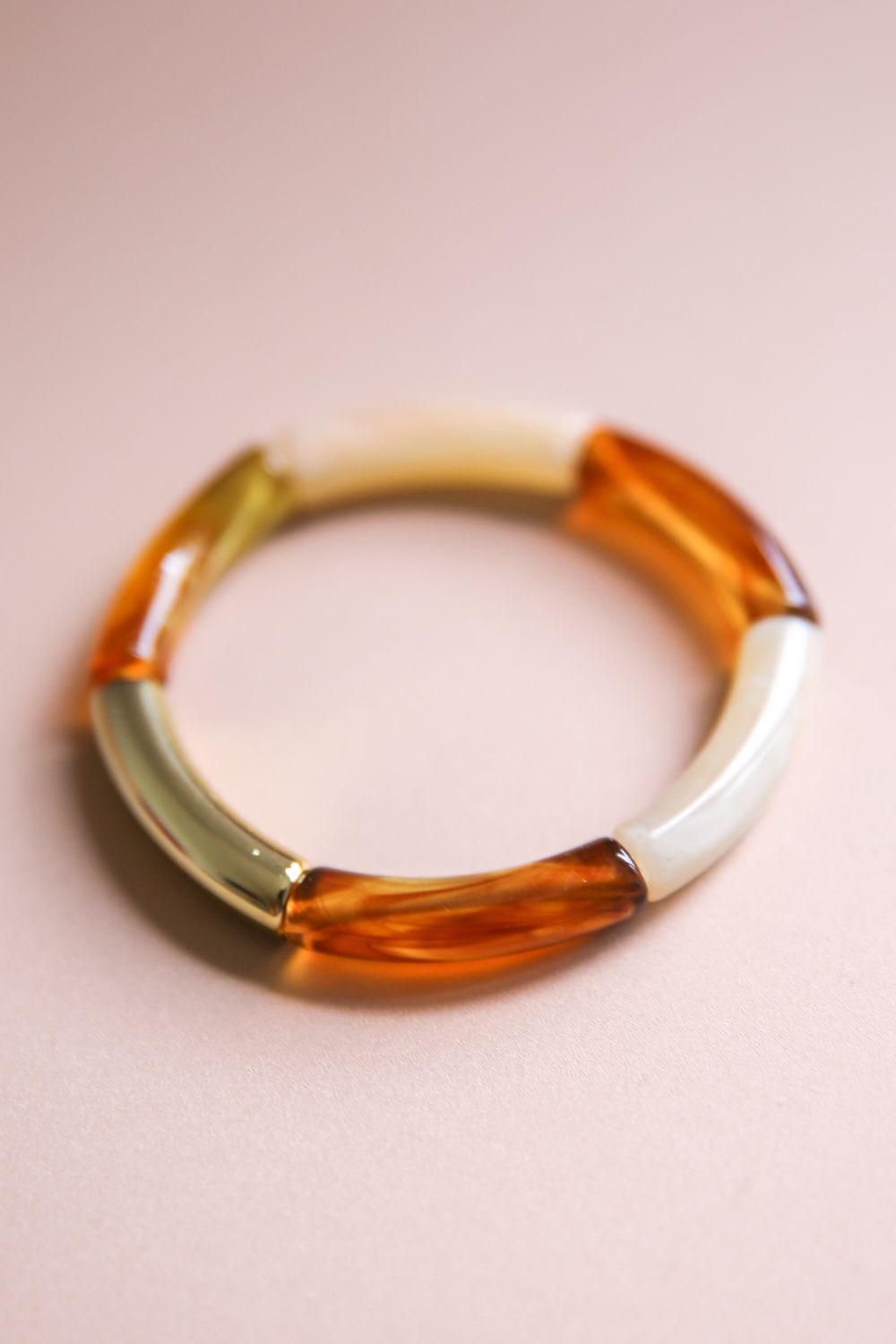 Armkette Tube bernstein gold