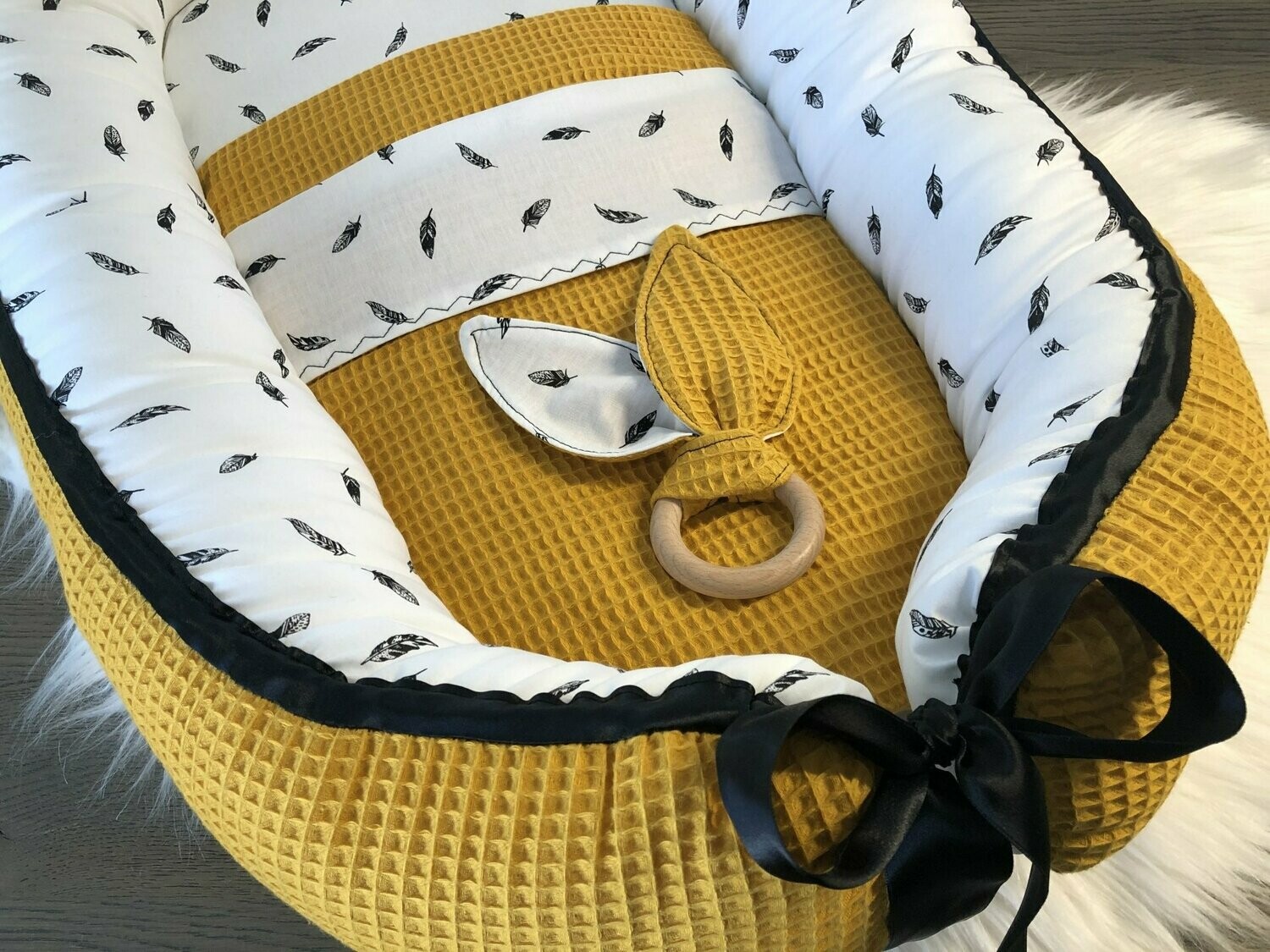 Babynest oker geel