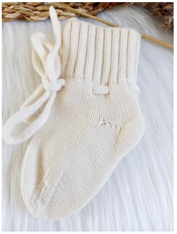 Merino babyslofjes creme