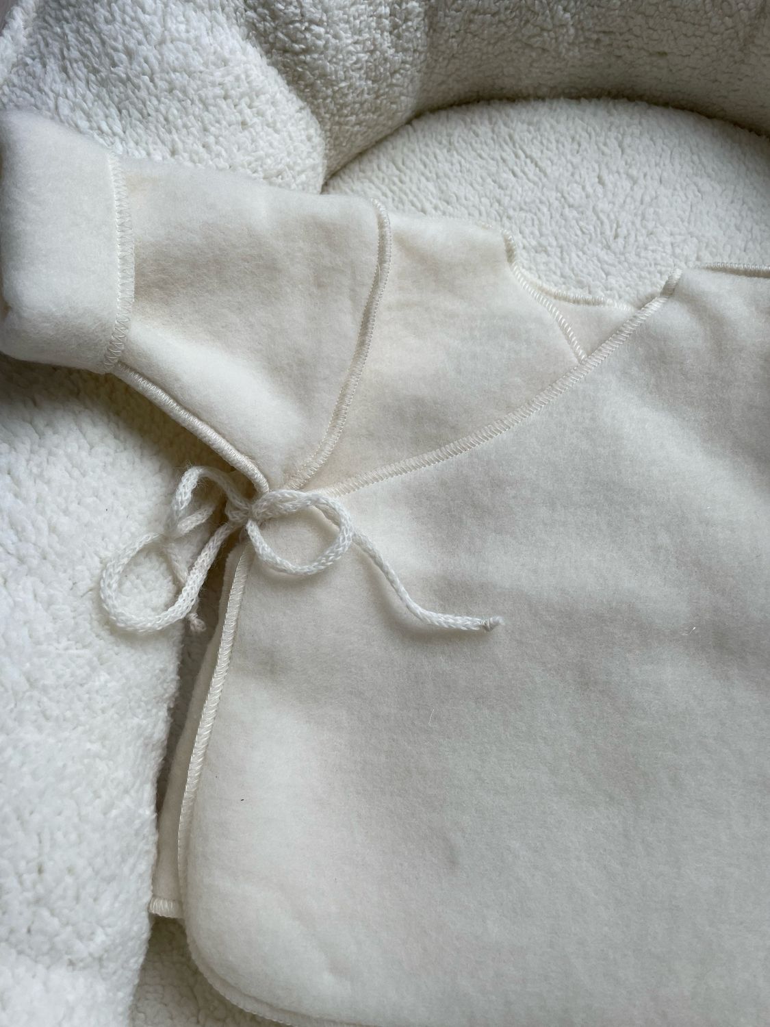 Wollen newborn baby vestje fleece naturel